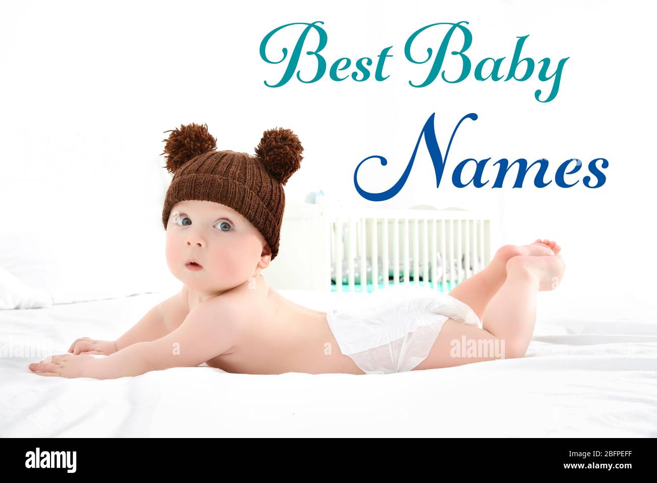 Concept of choosing baby names. Little child lying on bed Stock Photo Alamy