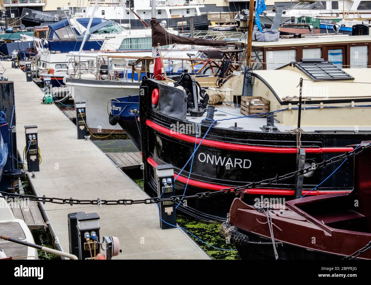 Boats moored at the wharf of Limehouse Marina, Tower Hamlets, East London, Uk Stock Photo