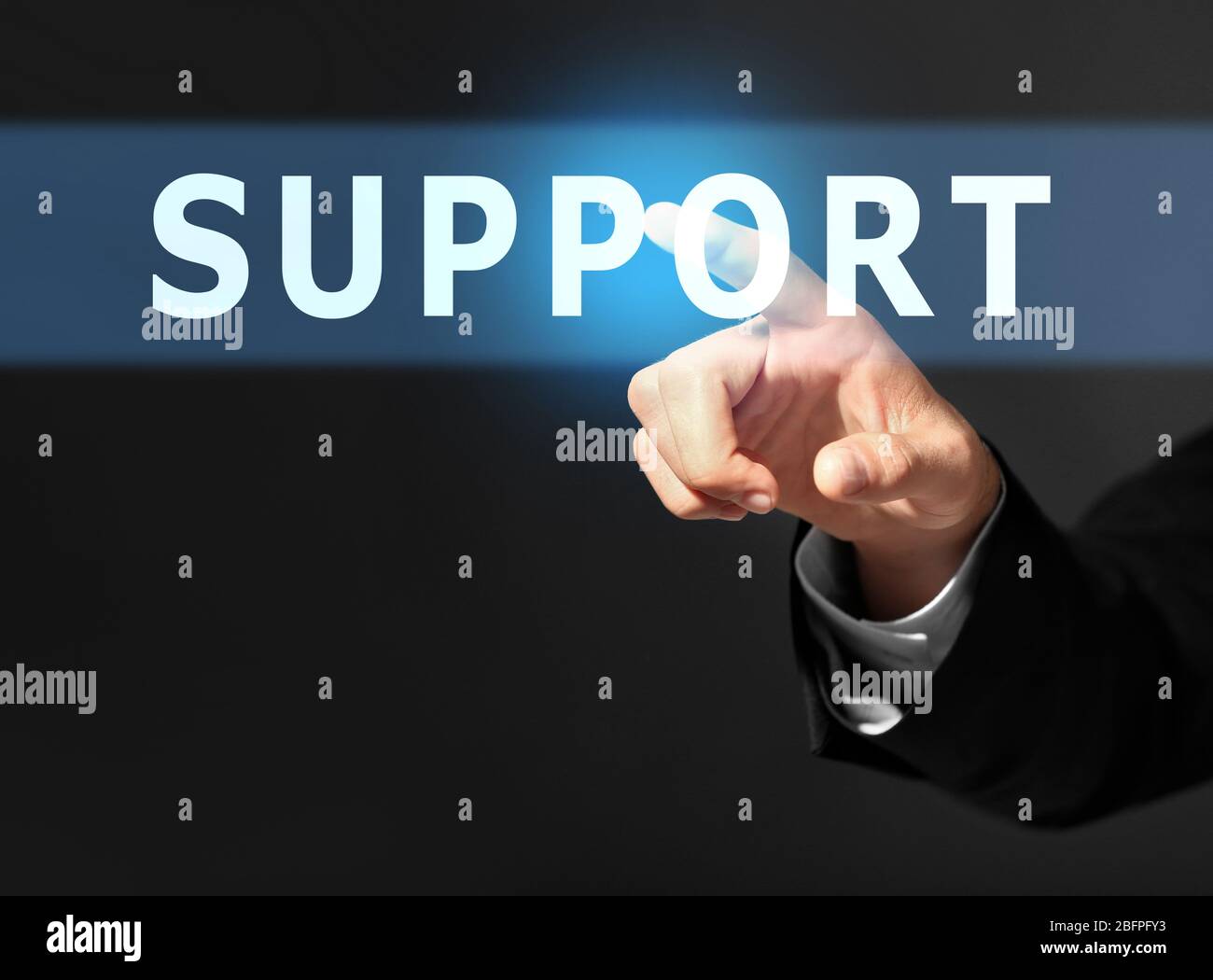 Support concept. Man pointing on text against black background, closeup Stock Photo