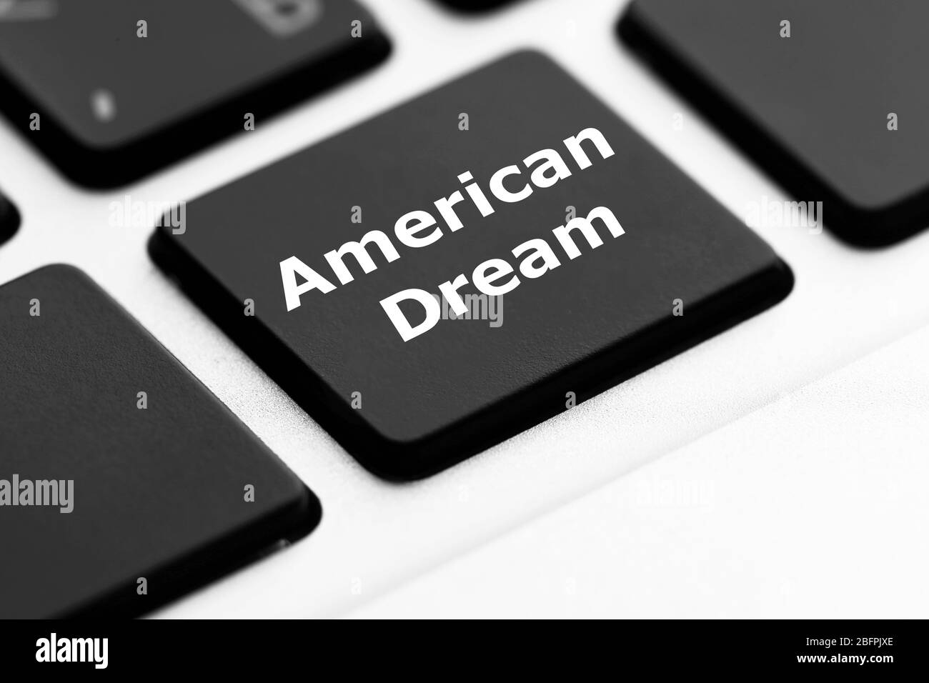 Text AMERICAN DREAM on keyboard button, closeup Stock Photo