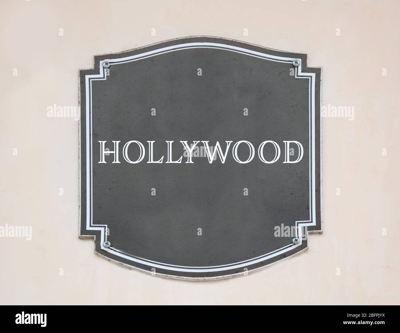 HOLLYWOOD signpost on wall. Travel USA concept Stock Photo