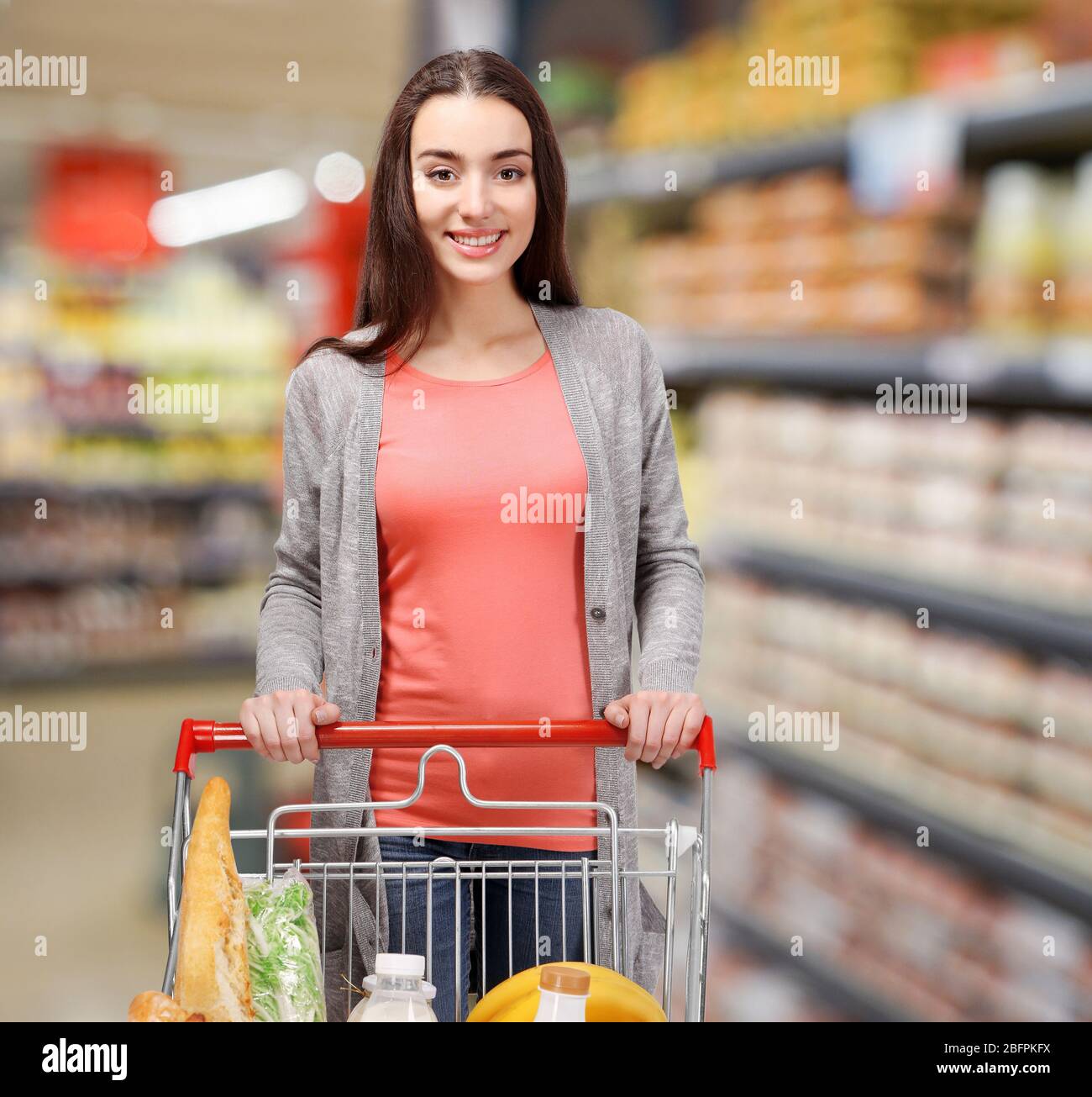 Young Woman With Market Trolley At Supermarket Stock Photo Alamy Young Woman With Market Trolley At Supermarket Stock Photo Alamy