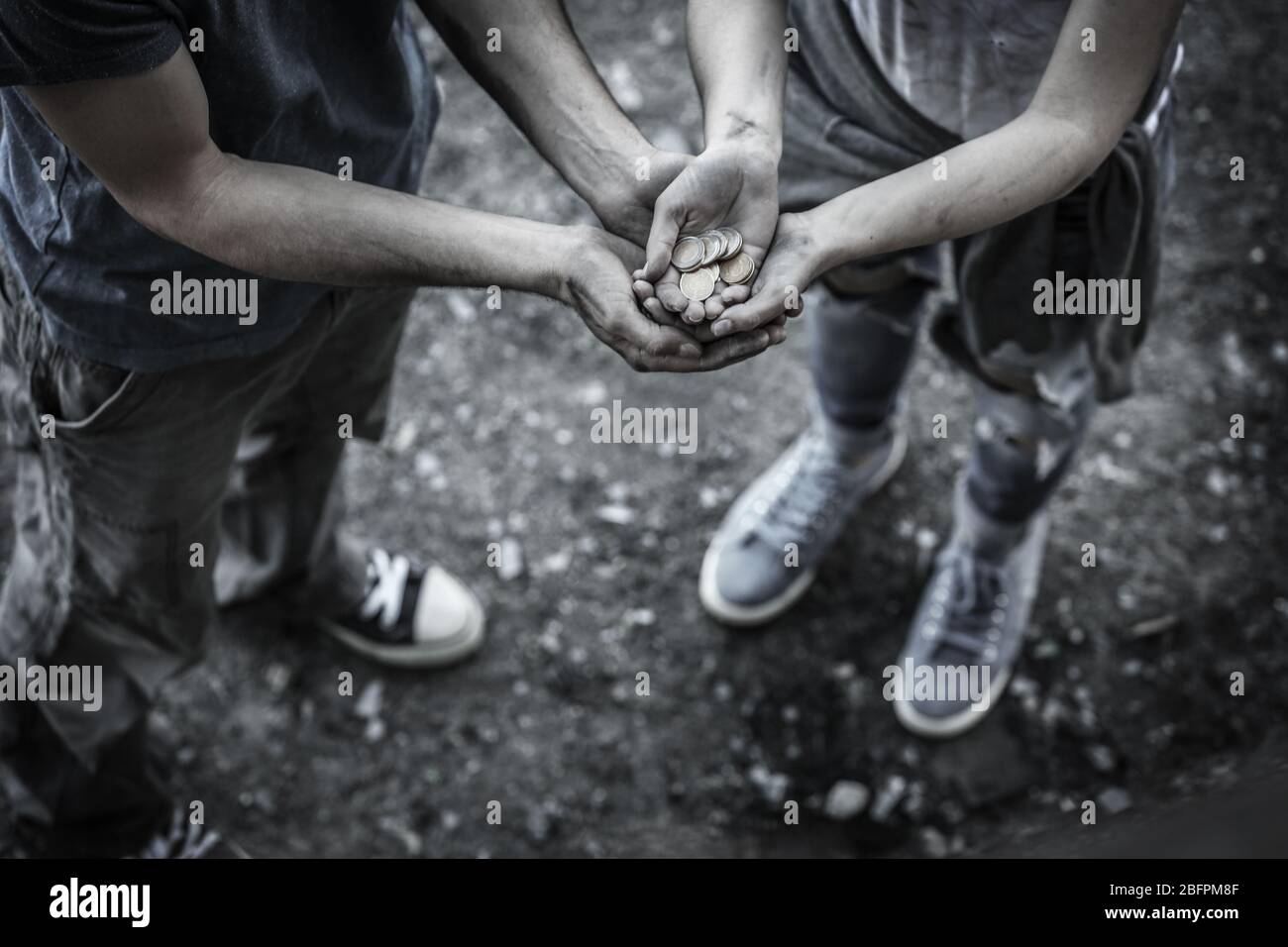 Poverty concept. Poor people begging for money on street Stock Photo