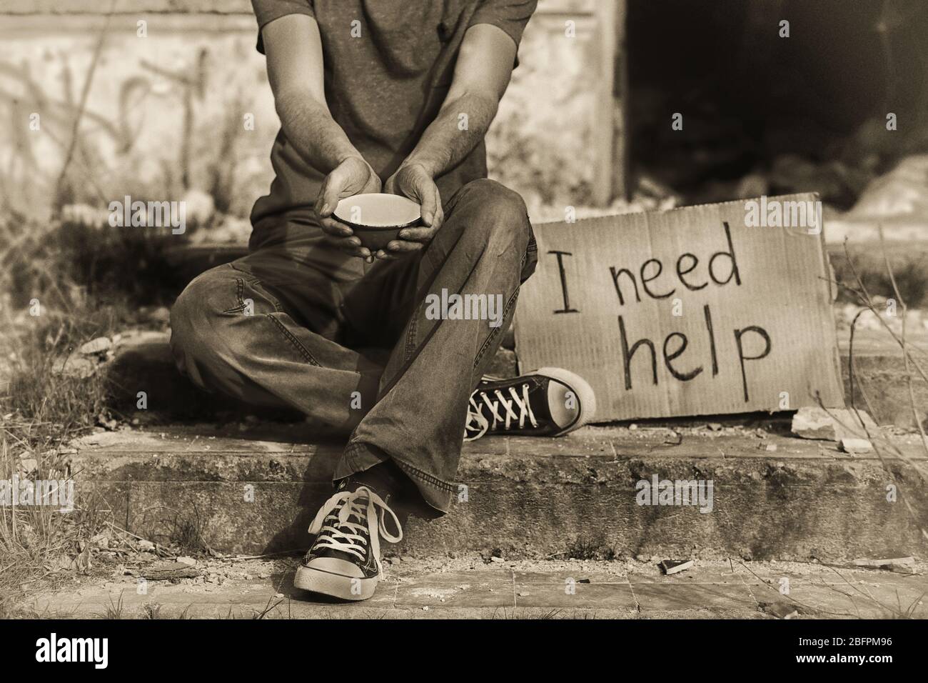 Poverty concept. Poor man begging for money on street Stock Photo - Alamy
