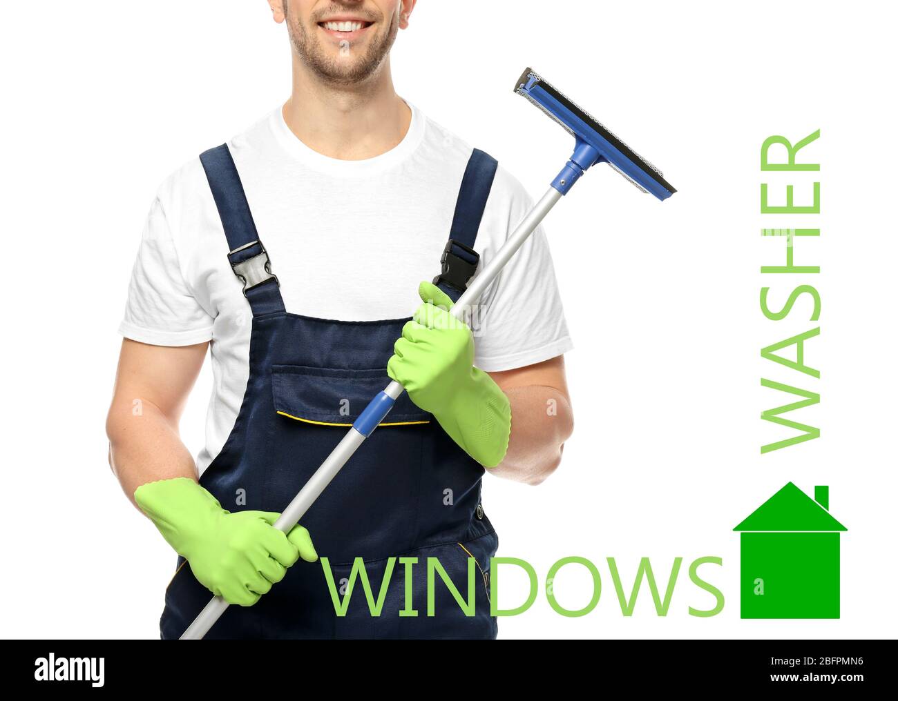 Young window cleaner with squeegee on white background Stock Photo