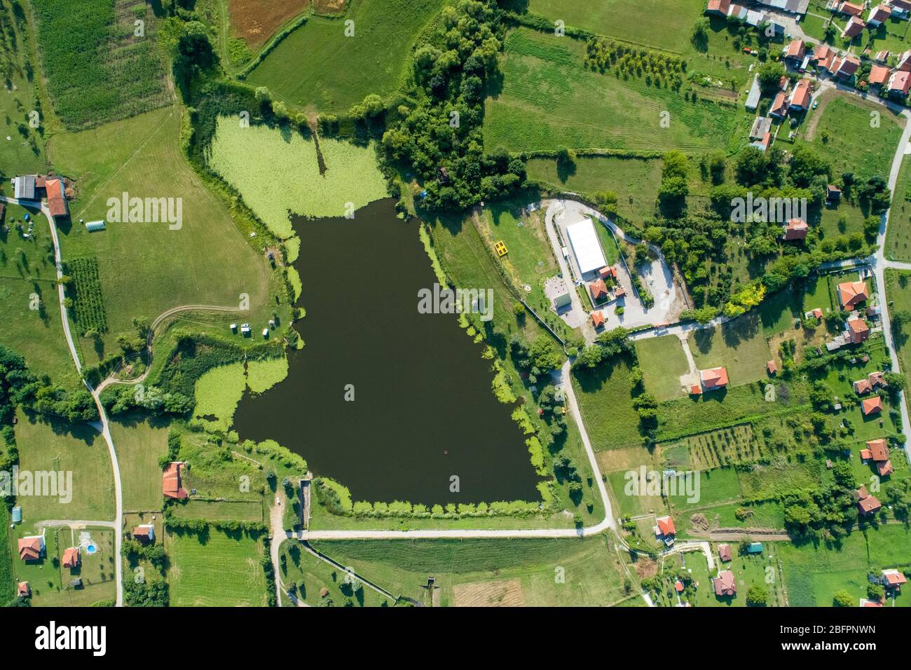 Petnica Lake aerial view - Petnicko Jezero Stock Photo - Alamy
