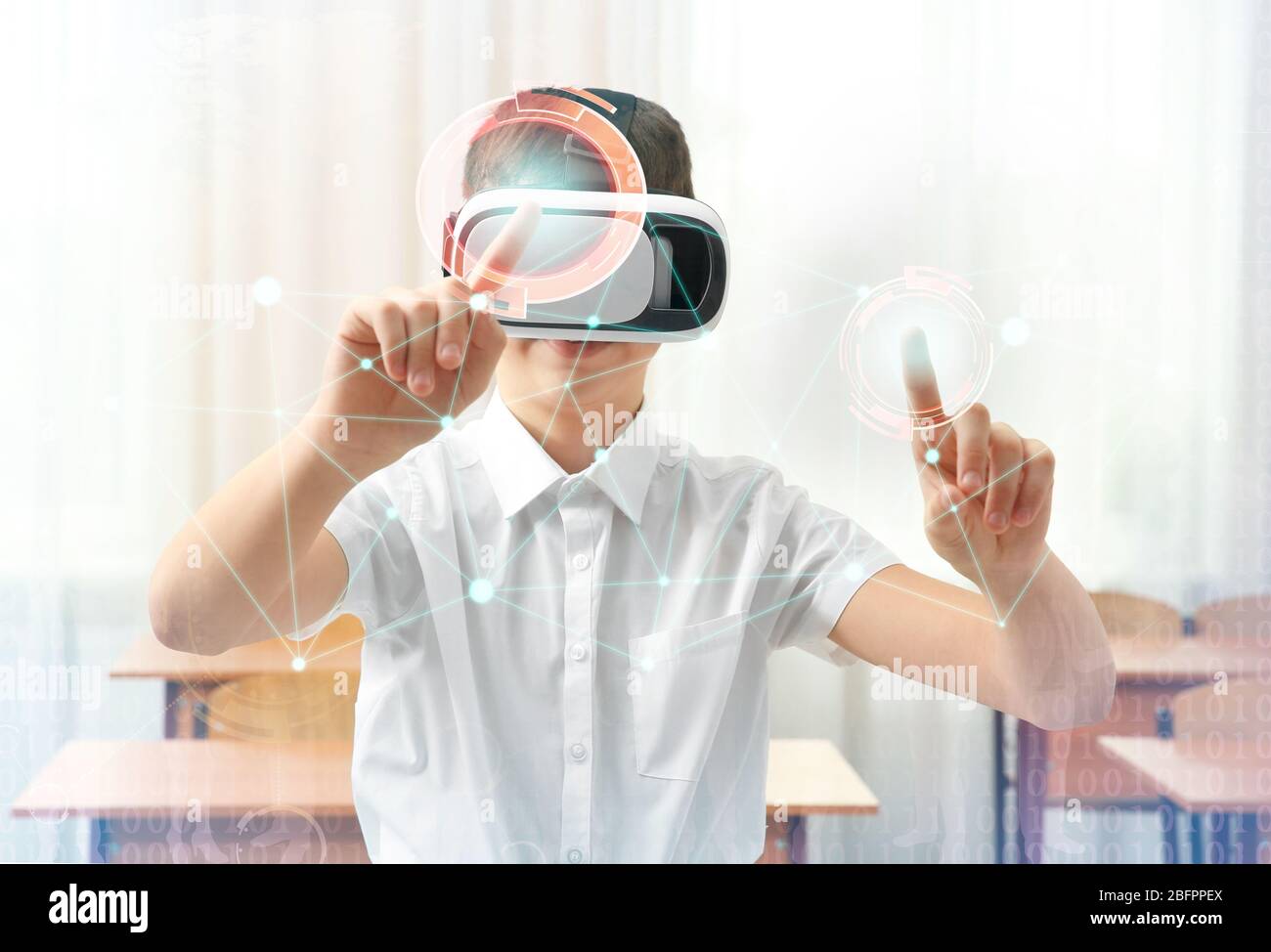 Boy with virtual reality glasses in classroom. Concept of school and