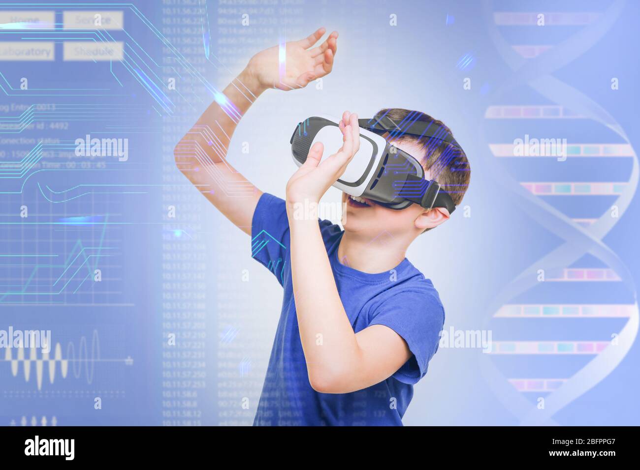 Boy with virtual reality glasses on color background. Concept of school and modern technology Stock Photo