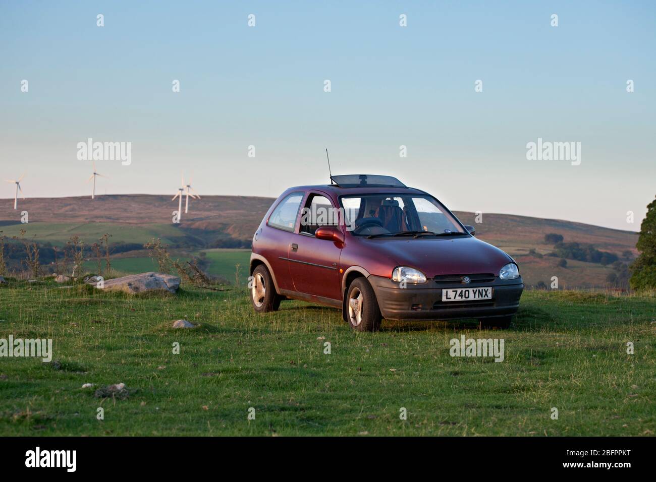 1993  L Registration burgundy 3 door hatchback Vauxhall / Opel Corsa car in the countryside Stock Photo