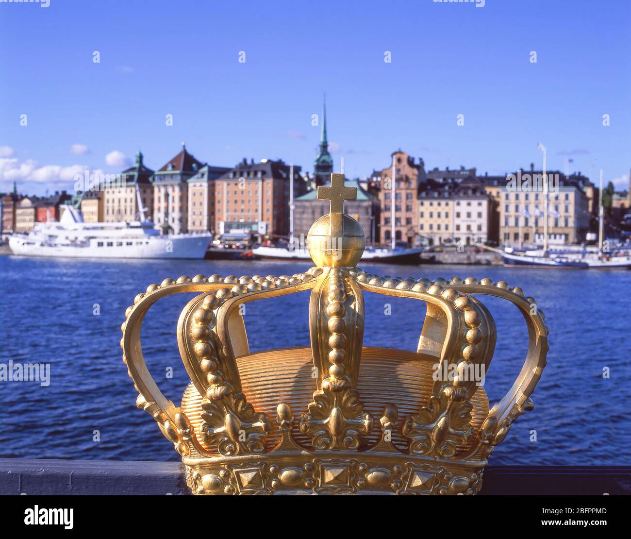 Royal Crown decoration with Gamla Stan (Old Town) behind, Stadsholmen, Stockholm, Kingdom of Sweden Stock Photo