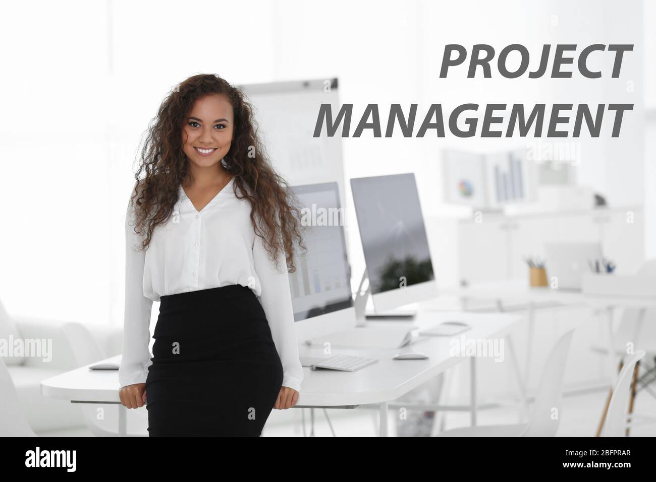 Concept of project management. African-American woman in modern office Stock Photo