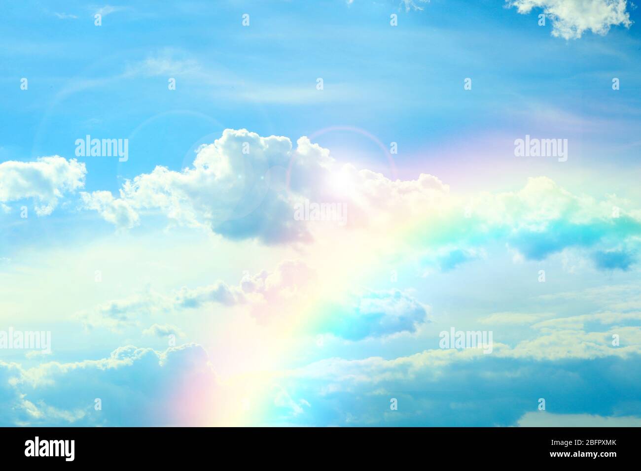 Beautiful view of clouds and rainbow in the sky Stock Photo - Alamy