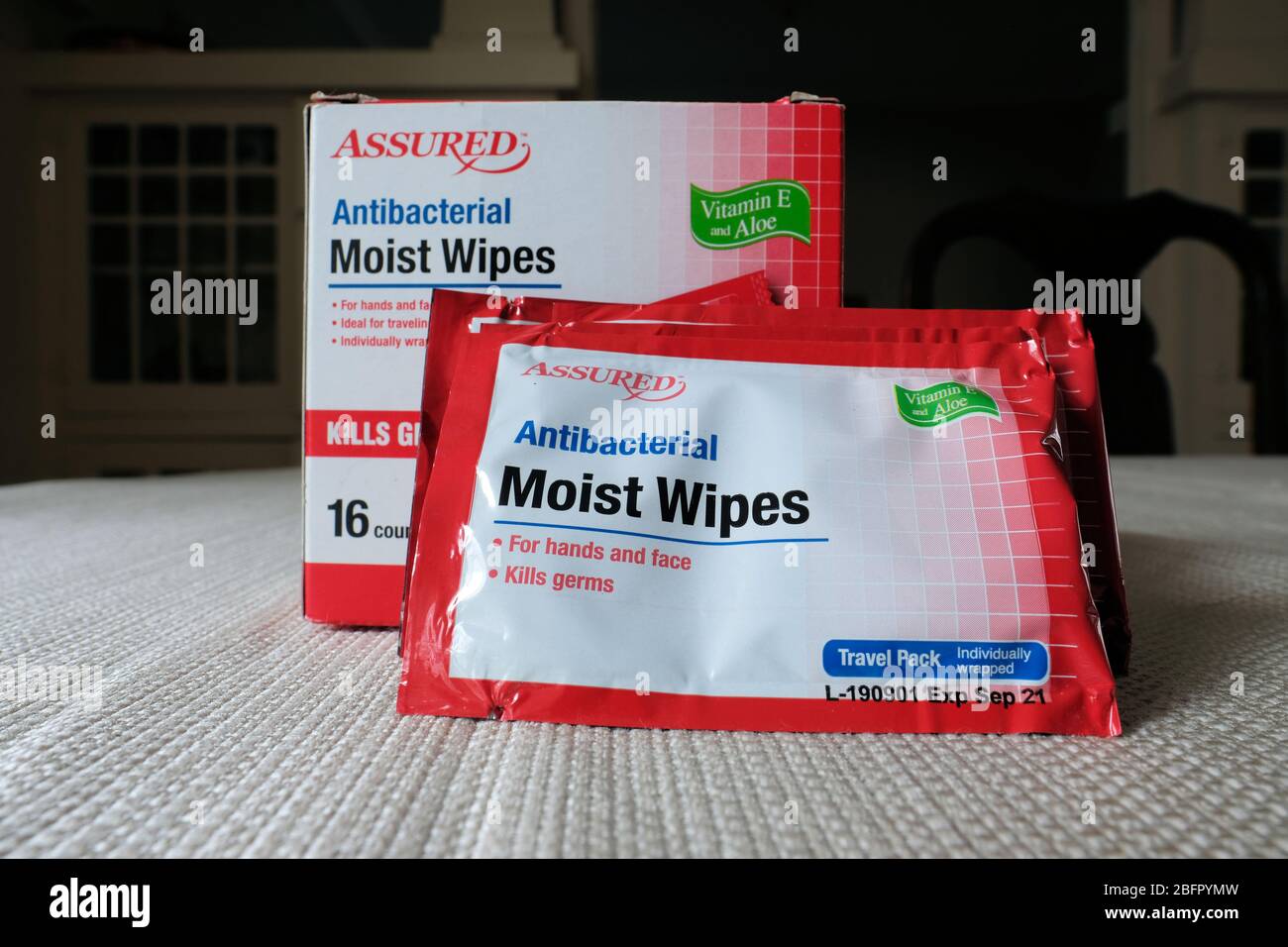 Box and packets of Assured brand antibacterial hand sanitizer moist wipes Stock Photo Alamy
