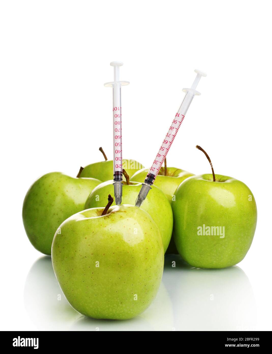 green apples and syringes isolated on white Stock Photo Alamy