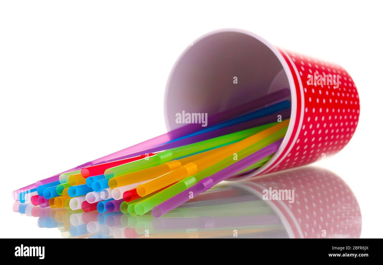red glass with straws isolated on white Stock Photo