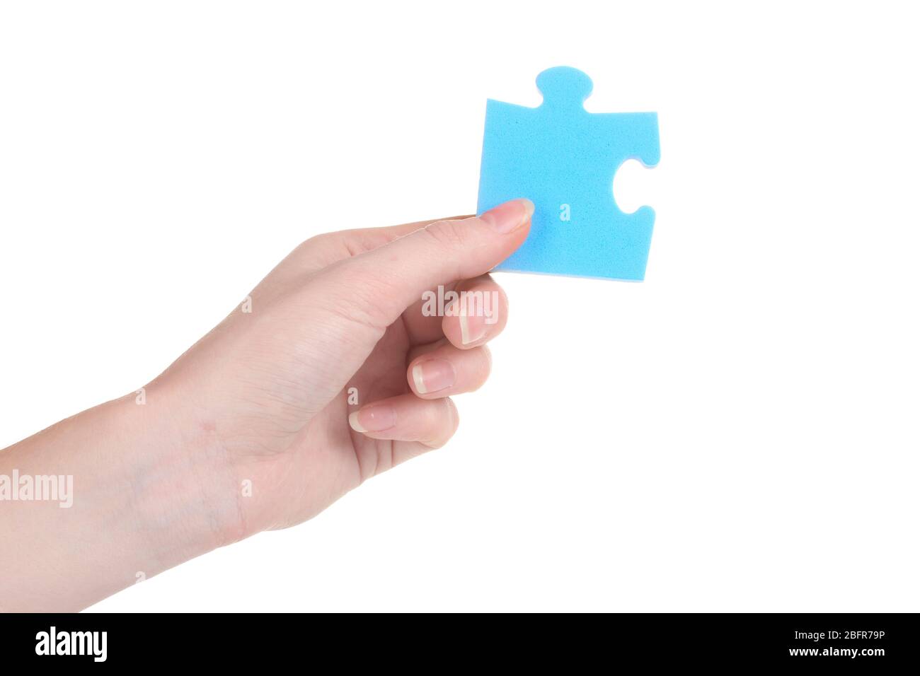 Hand and puzzle, isolated on white Stock Photo - Alamy
