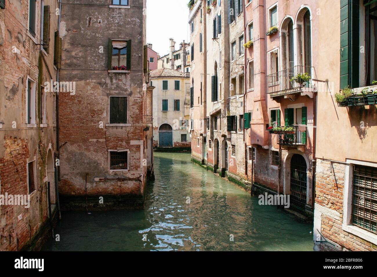Canal entrances to the many buildings. Venice Italy Stock Photo