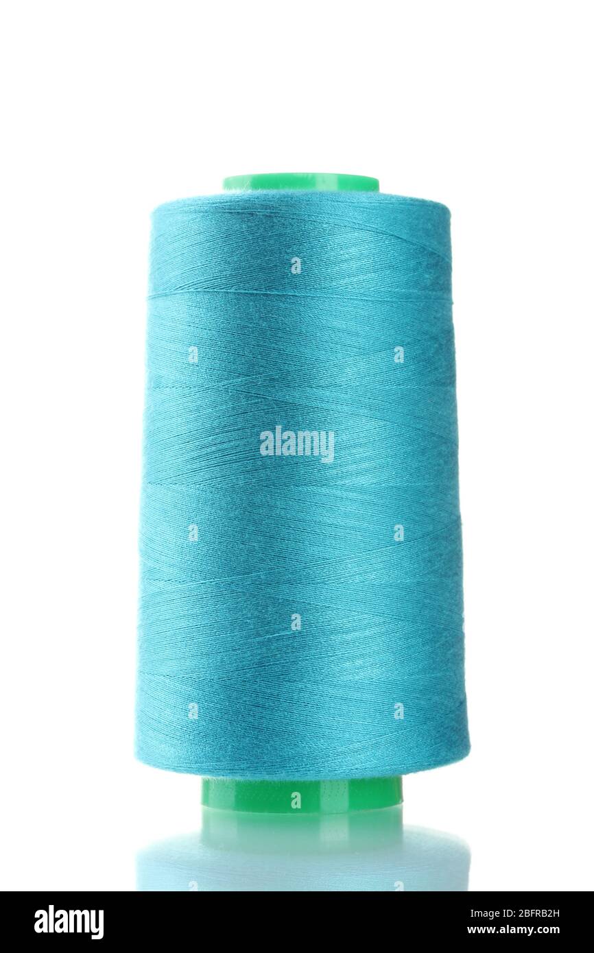 Blue bobbin thread isolated on white Stock Photo Alamy