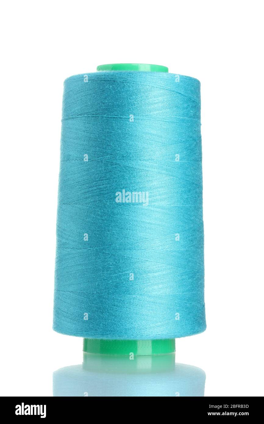 Blue bobbin thread isolated on white Stock Photo - Alamy