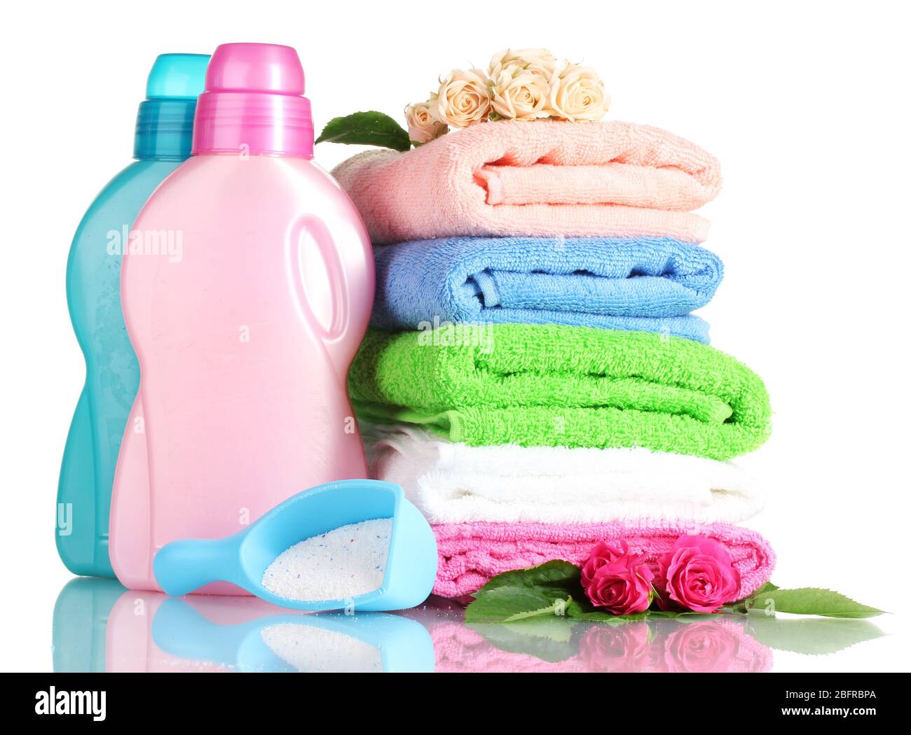 Detergent with washing powder and towels isolated on white Stock Photo
