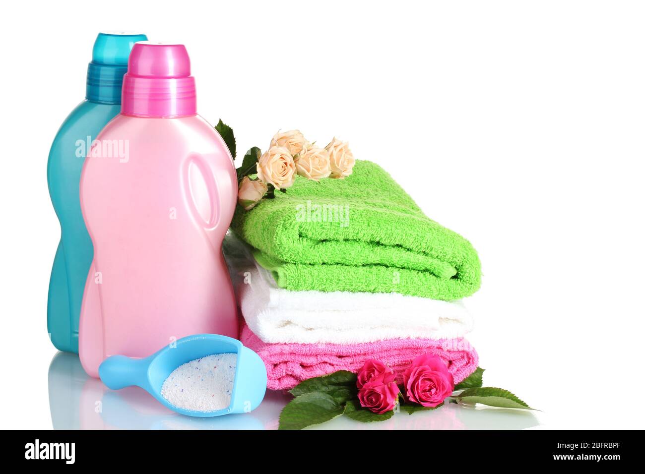 Detergent with washing powder and towels isolated on white Stock Photo