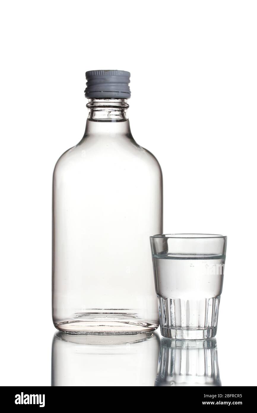 Bottle of vodka and wineglass isolated on white Stock Photo Alamy