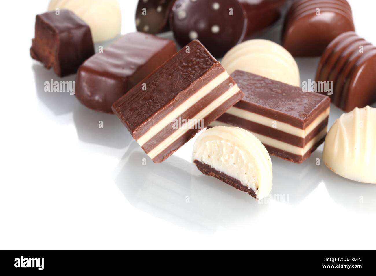 Many different chocolate candy isolated on white Stock Photo - Alamy