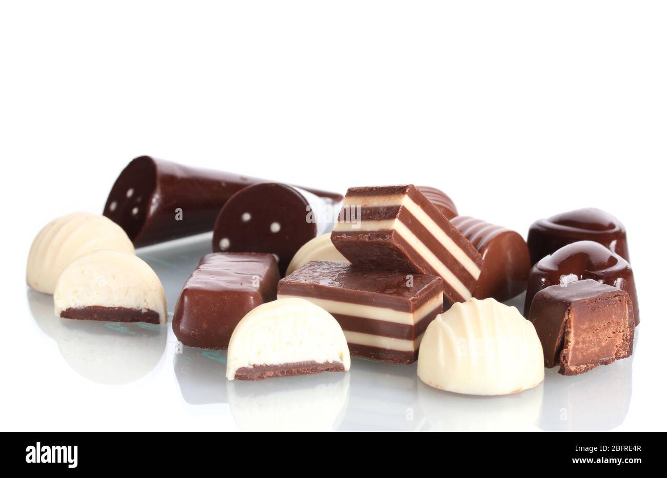 Many different chocolate candy isolated on white Stock Photo - Alamy