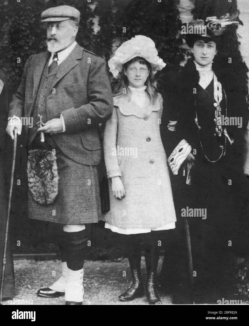 King Edward VII (1841-1910) with young Lady Alexander Duff (1891-1926), the King's granddaughter, and Princess Victoria (1868-1935), the King's second daughter, c. 1902.   To see my Royals-related vintage images, Search:  Prestor  vintage  Royal Stock Photo