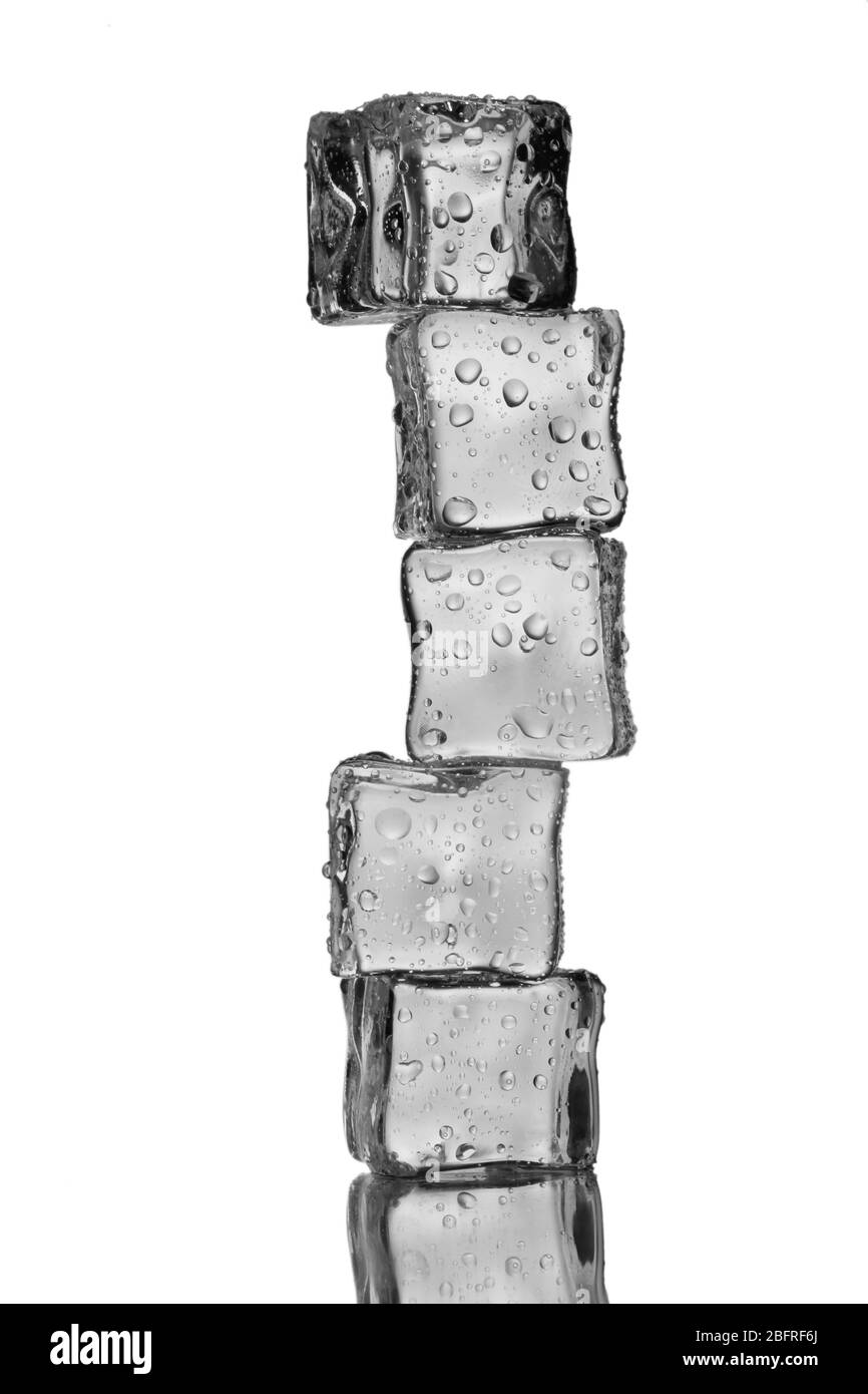Melting ice cubes isolated on white Stock Photo - Alamy