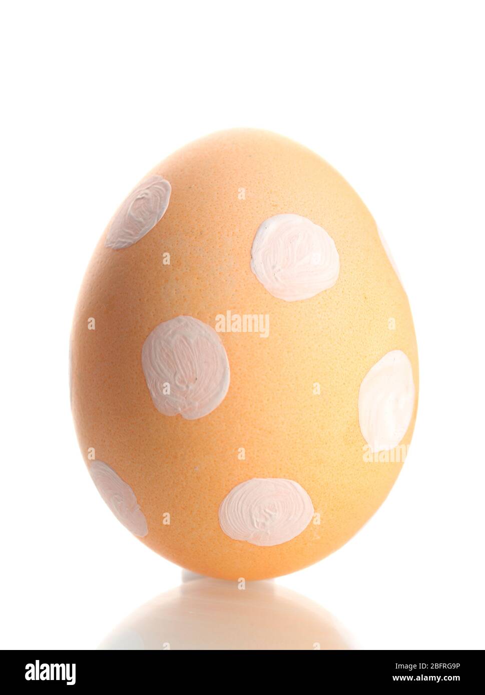Yellow Easter Egg  with white point isolated on white Stock Photo