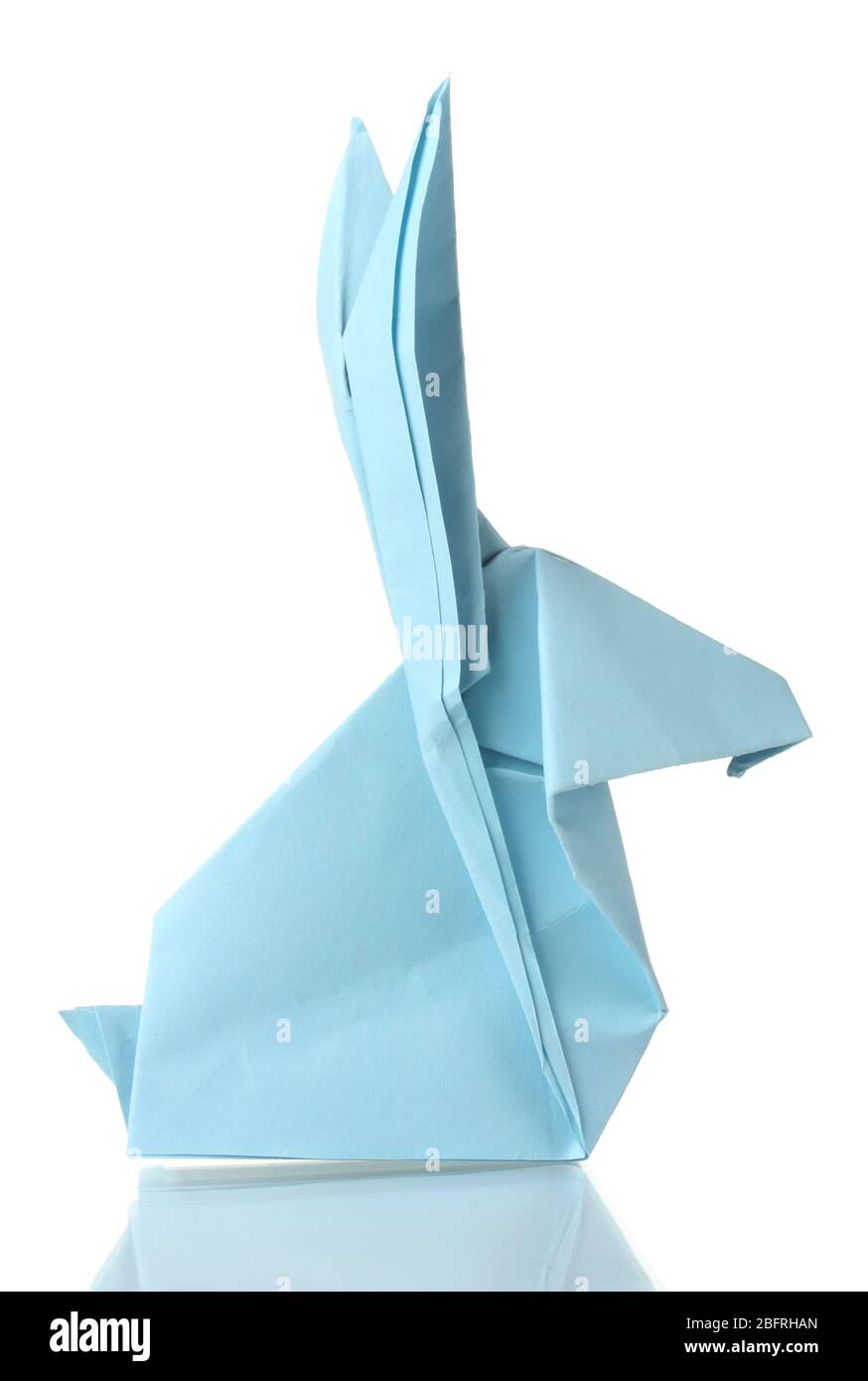 Origami Blue Rabbit Origami rabbit out of the blue paper isolated on white Stock Photo - Alamy