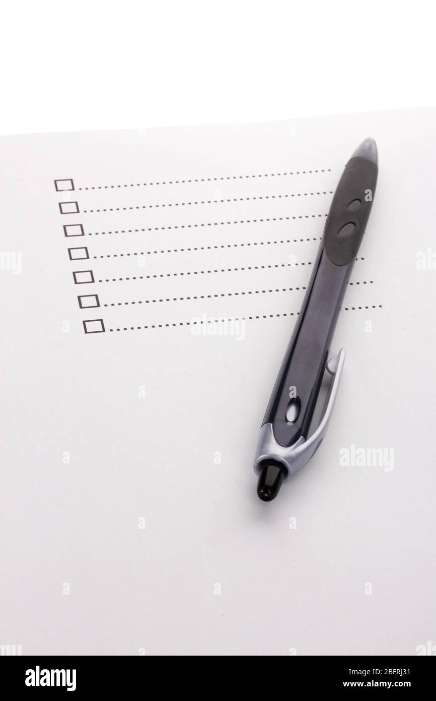 Checklist and pen closeup Stock Photo
