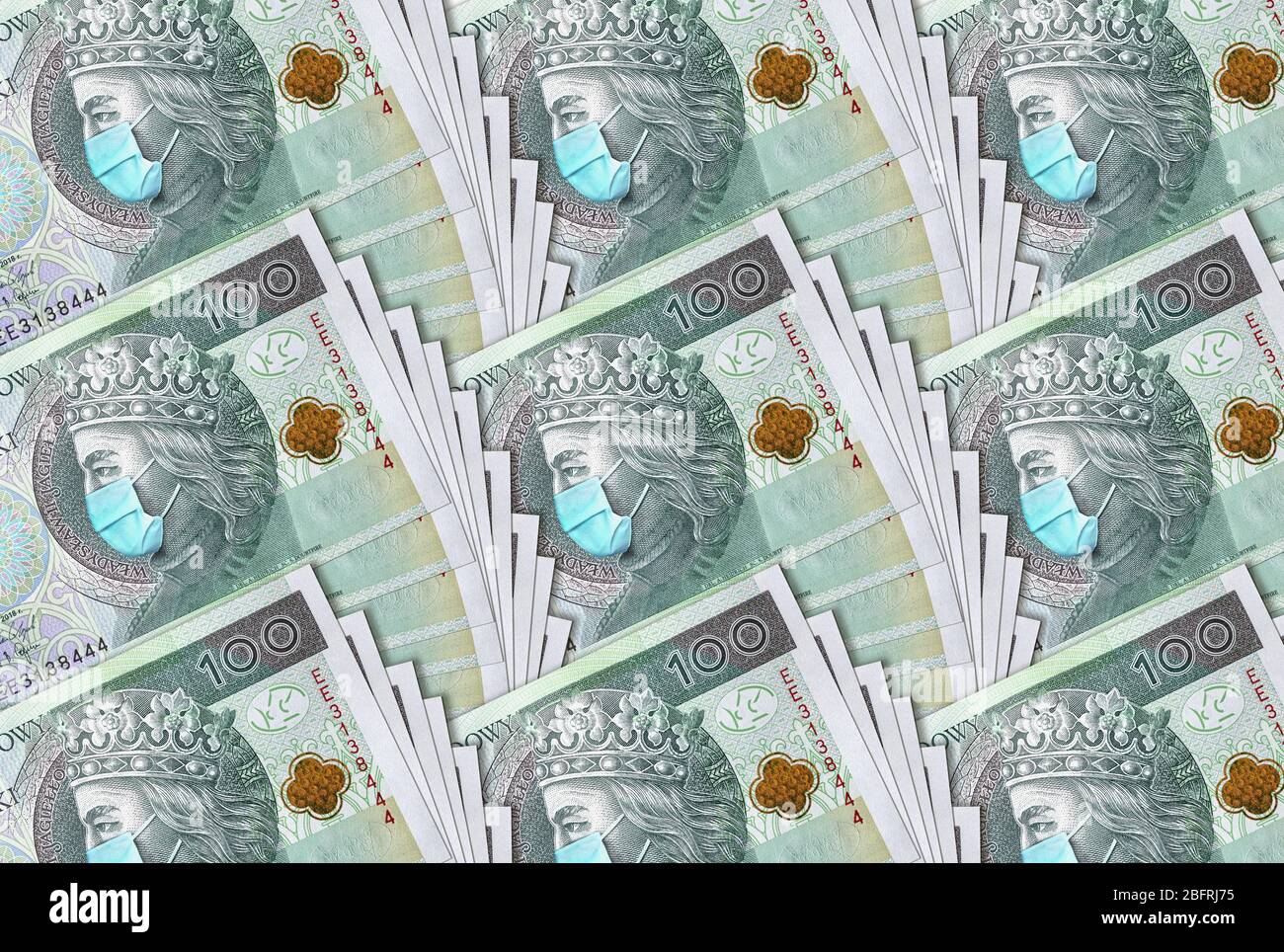 Coronavirus in Poland. Quarantine and global recession. 100 Polish zloty banknotes with a face mask against infection. Global economy hit by covid19 Stock Photo