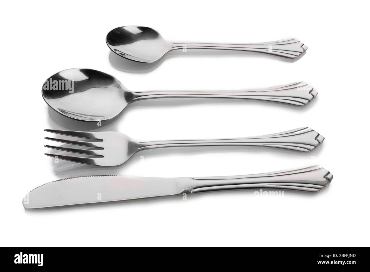 Silver fork and spoon, knife isolated on white Stock Photo Alamy