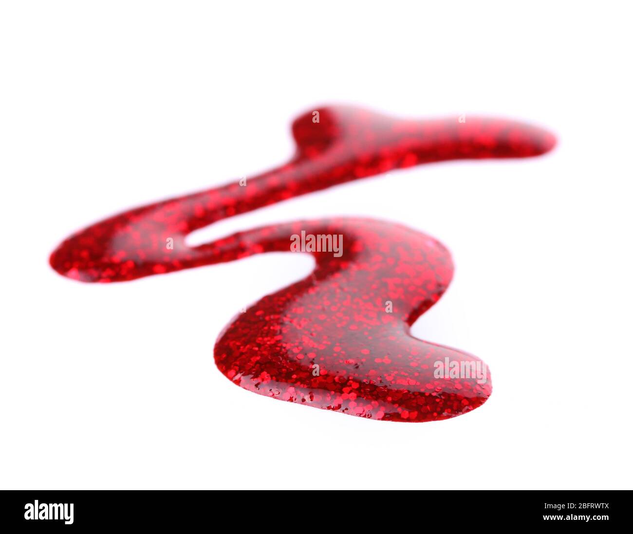 Red nail polish drops isolated on white Stock Photo Alamy