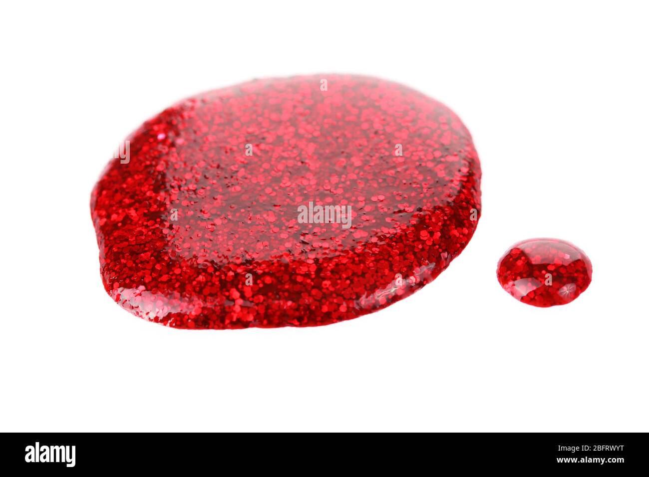 Red nail polish drops isolated on white Stock Photo Alamy
