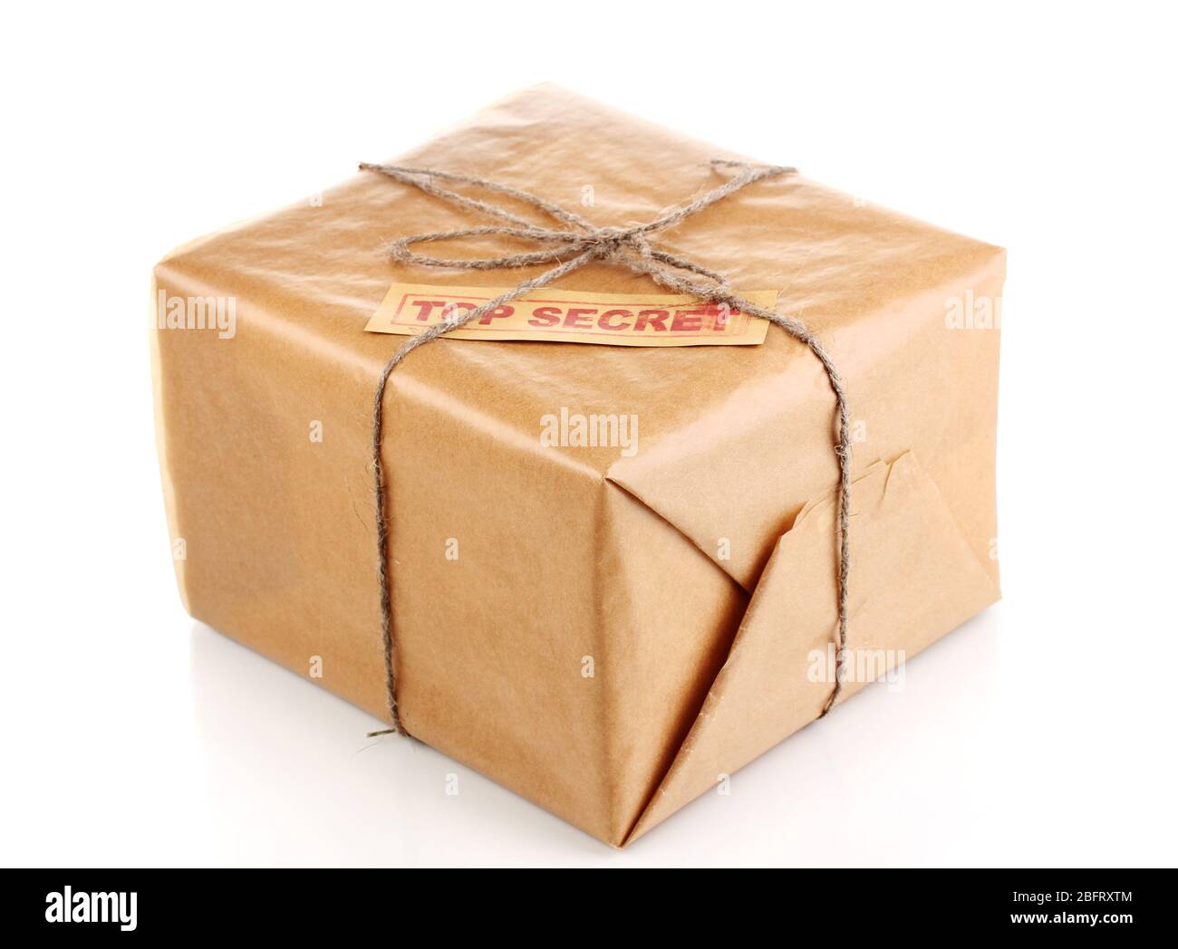 Parcel with top secret stamp isolated on white Stock Photo