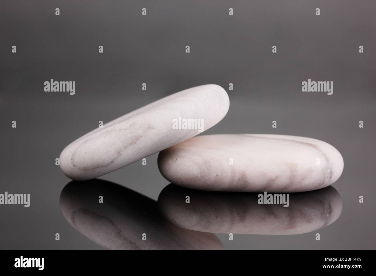 Two hot black stones hi-res stock photography and images - Alamy