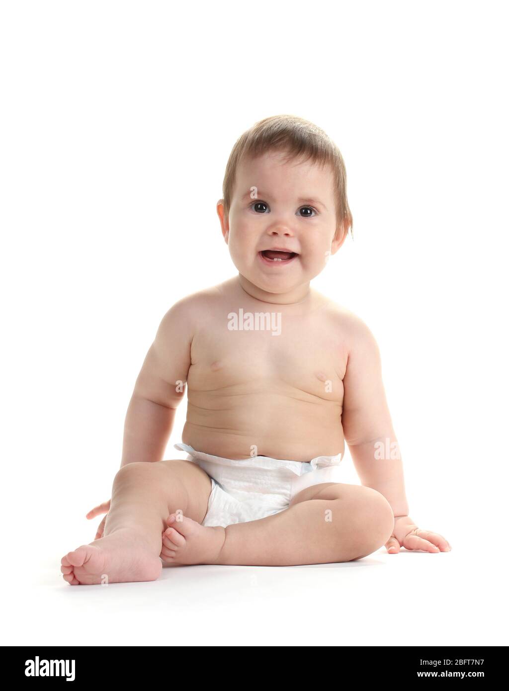 Cute baby girl sitting isolated on white Stock Photo - Alamy