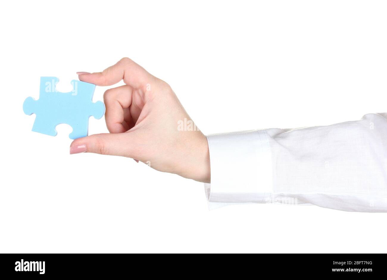 woman hand holding puzzle isolated on white Stock Photo - Alamy