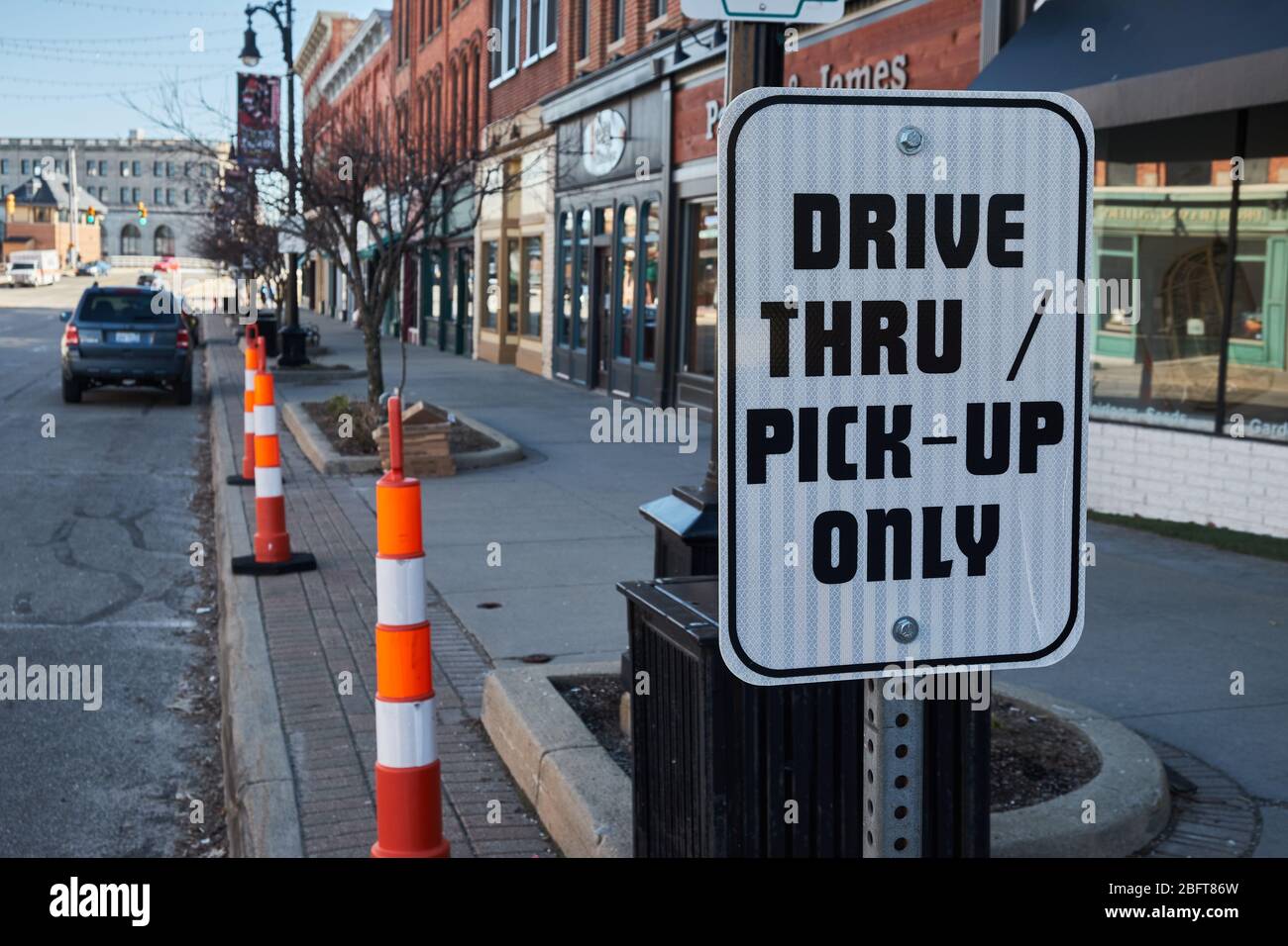 Photograph of temporary sign in front of restaurant saying 'Drive thru Pick Up Only' in small town USA Stock Photo