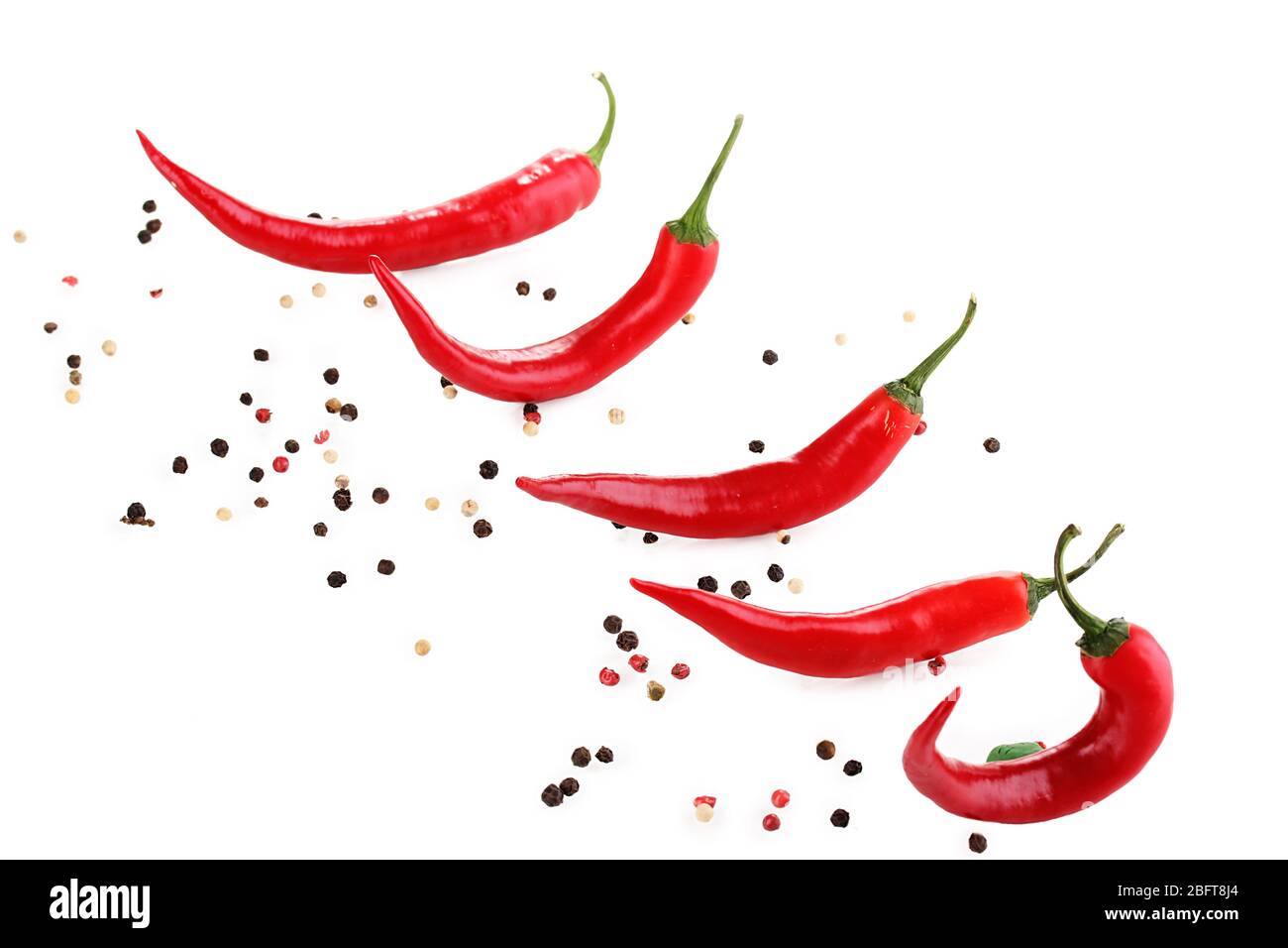 Red hot chili peppers isolated on white Stock Photo - Alamy