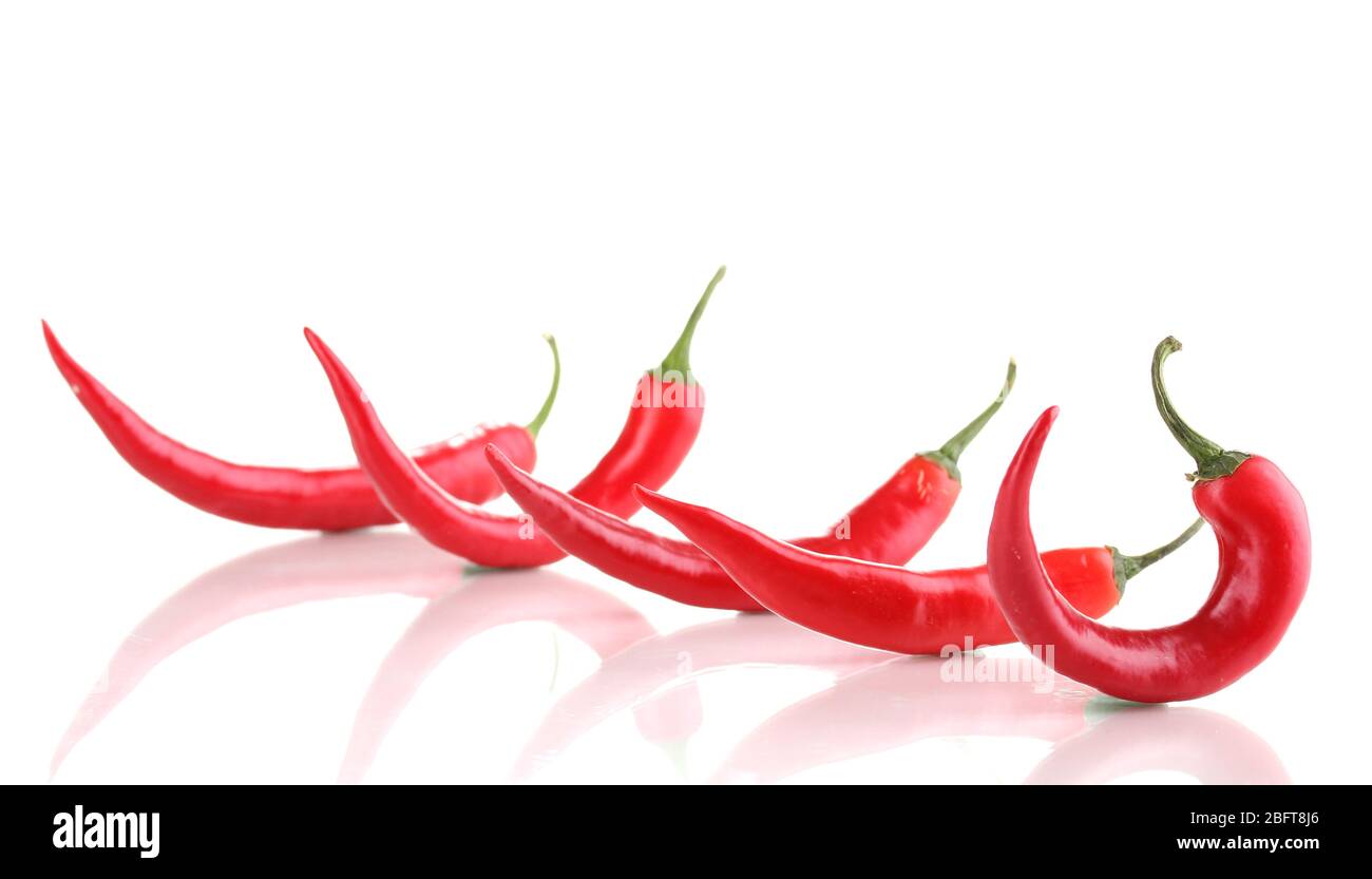 Red hot chili peppers isolated on white Stock Photo - Alamy