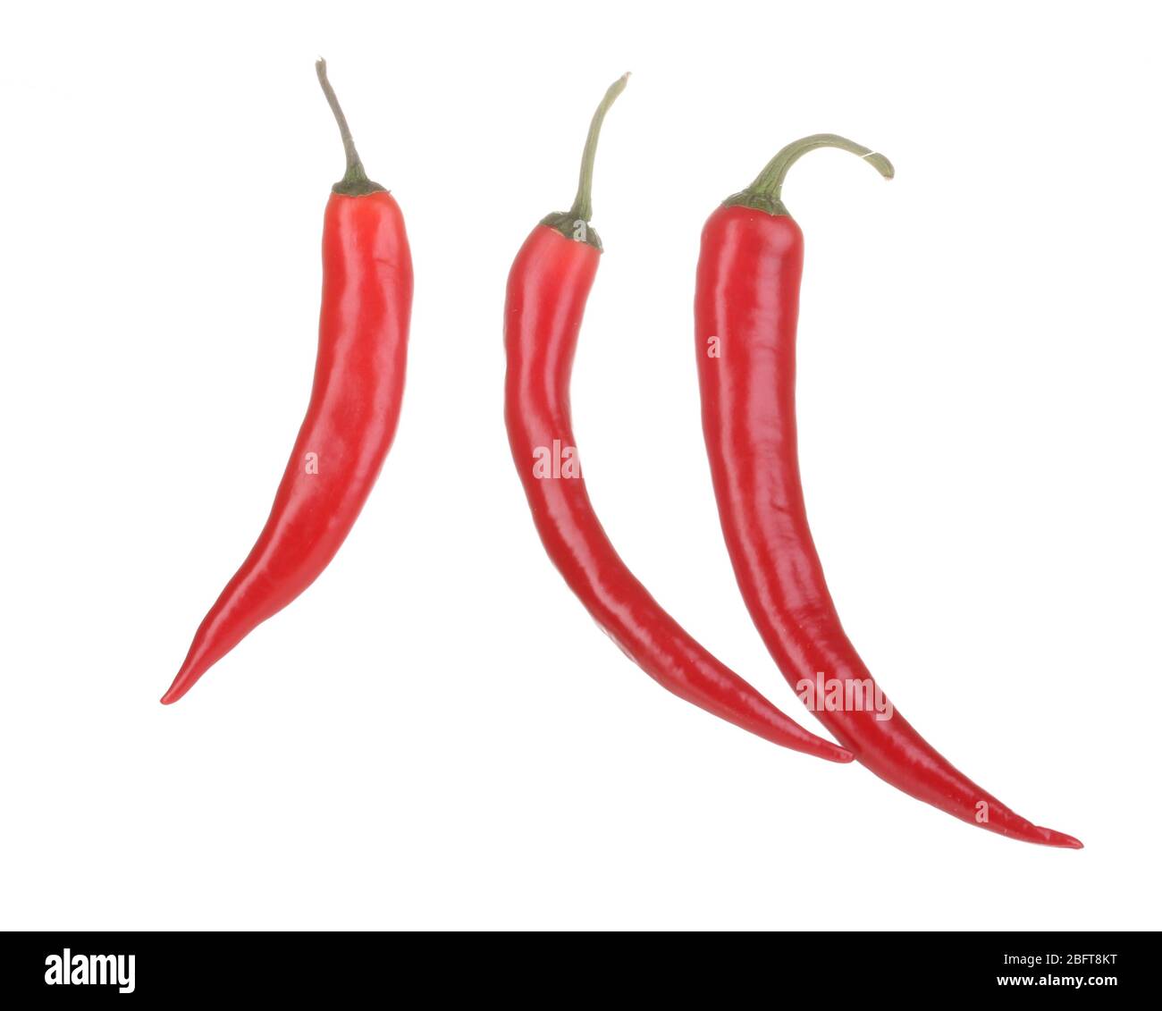 Red hot chili peppers isolated on white Stock Photo - Alamy