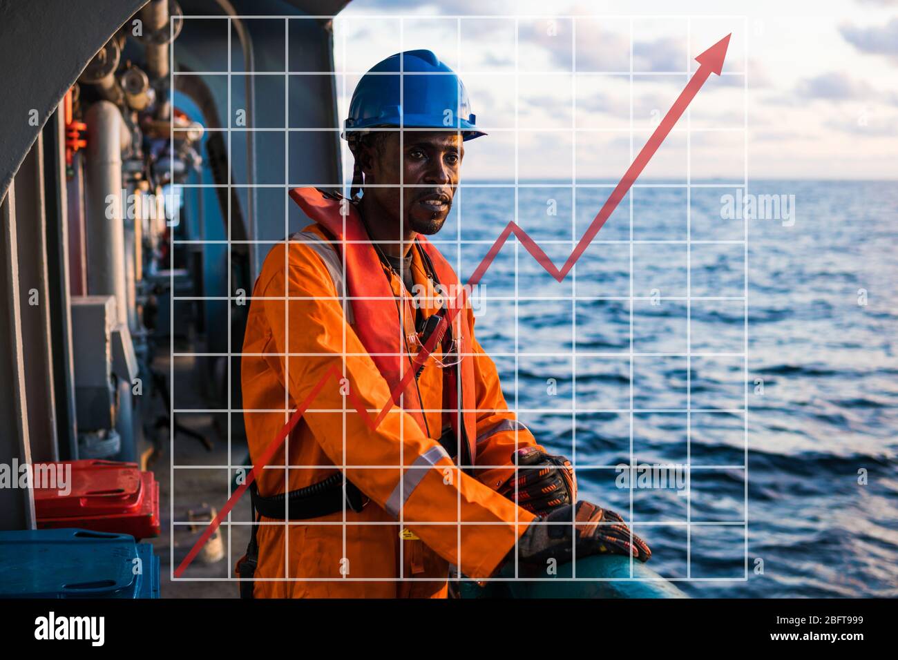 Concept of growth up in marine industry with rising graphics. Seaman AB or Bosun on deck of vessel or ship , wearing PPE Stock Photo