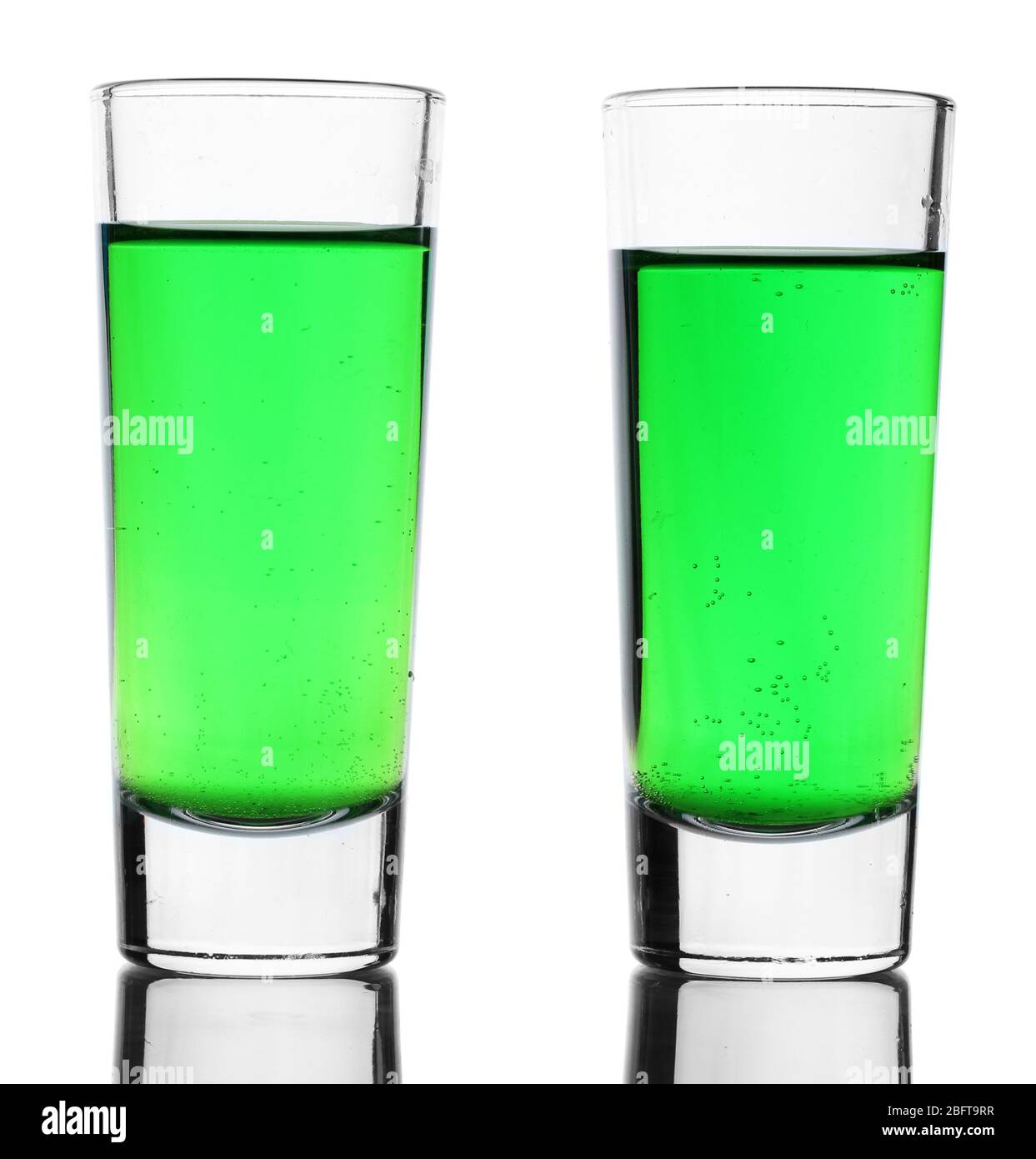 Two glasses of absinthe isolated on white Stock Photo