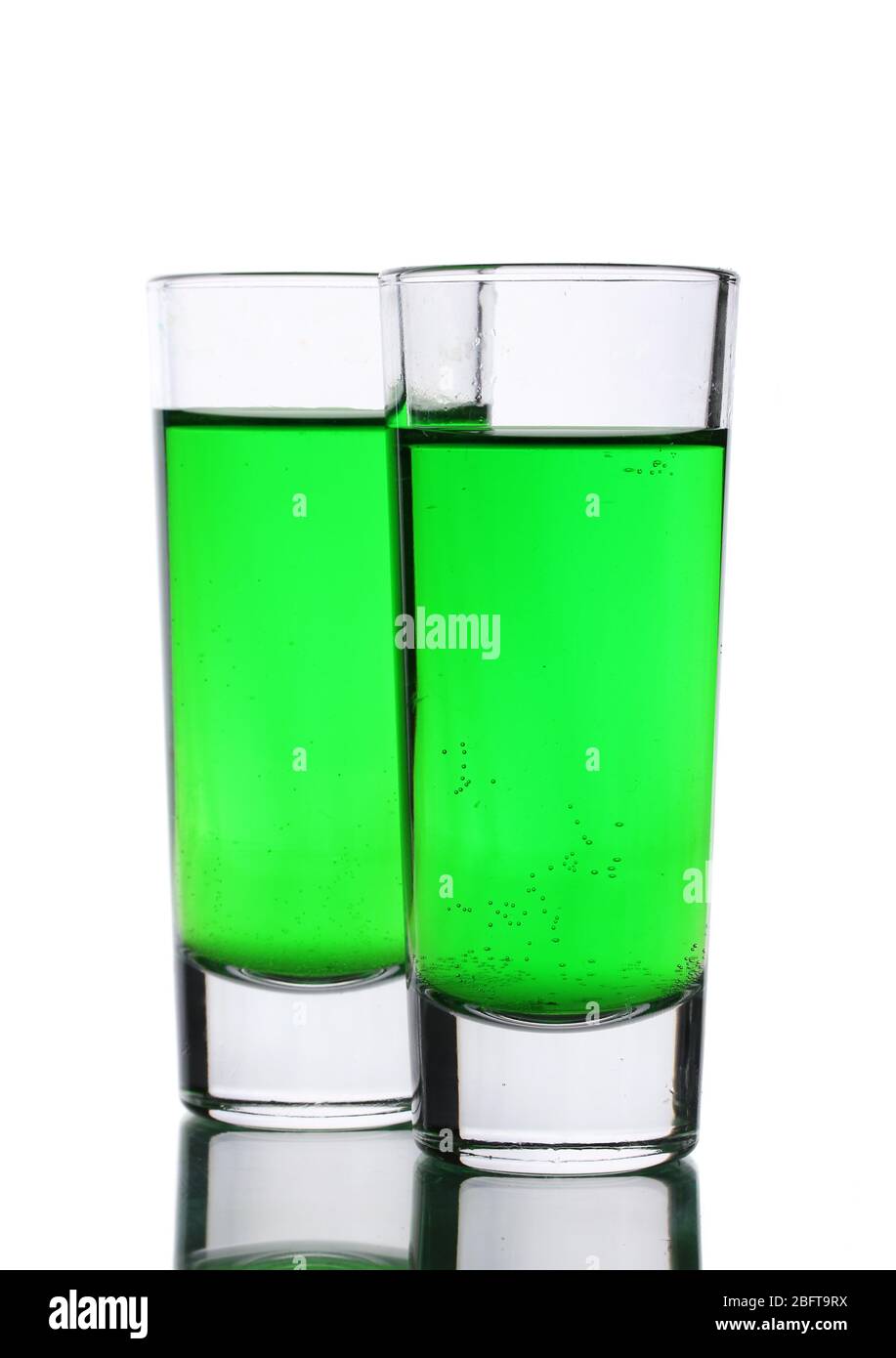 Two glasses of absinthe isolated on white Stock Photo
