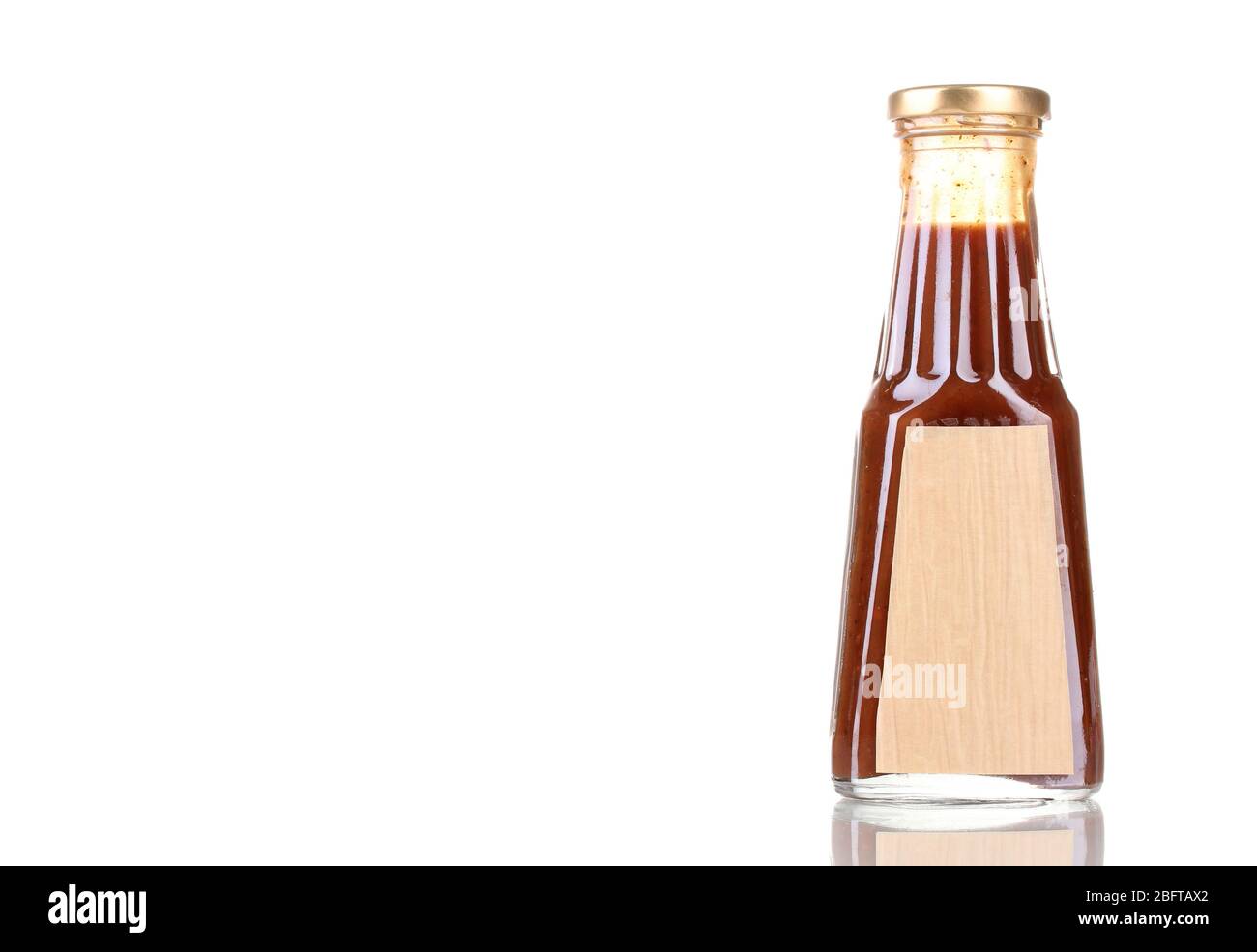Tomato sauce in glass bottle isolated on white Stock Photo - Alamy