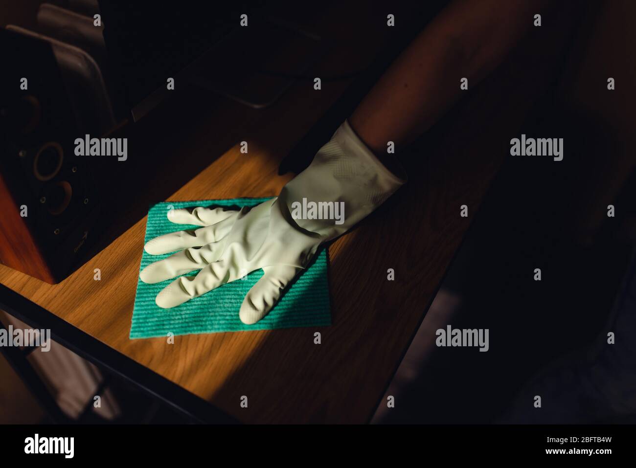 Woman wipes dust on furniture. Hand and cloth Stock Photo Alamy